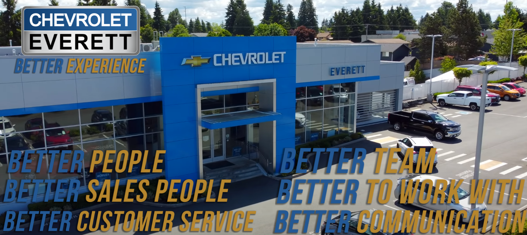 Exterior view of Chevrolet Everett dealership displaying the slogan 'Better Sales, Better Customer Service.'