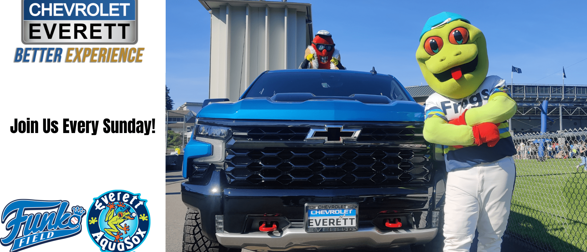 A cheerful cartoon frog poses next to a bright blue truck